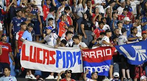 De visitante o de local